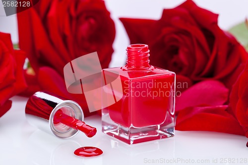 Image of Elegant red nail varnish in a stylish bottle