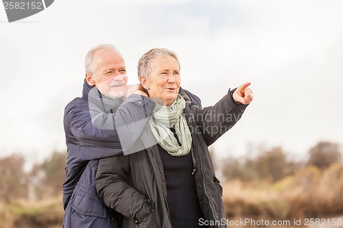 Image of happy senior couple elderly people together outdoor