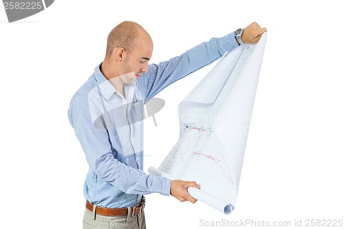 Image of Architect reading a blueprint