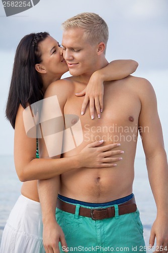 Image of smiling young couple having fun in summer holiday