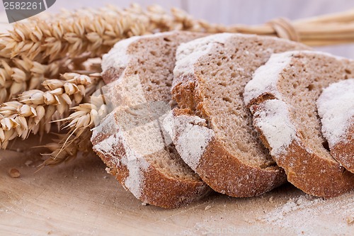 Image of homemade fresh baked bread and knife 