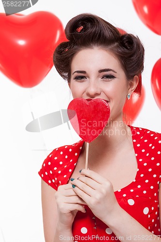 Image of Beautiful retro woman celebrating Valentines