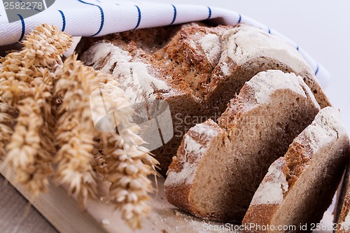 Image of homemade fresh baked bread and knife 