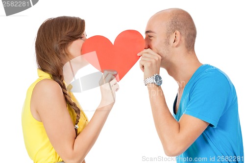 Image of happy young couple in love with red heart valentines day 