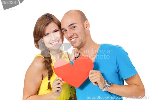 Image of happy young couple in love with red heart valentines day 