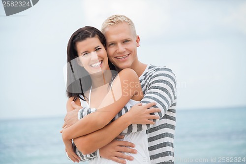 Image of smiling young couple having fun in summer holiday