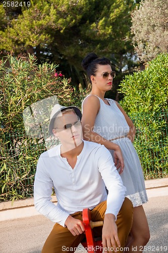 Image of Elegant trendy young couple