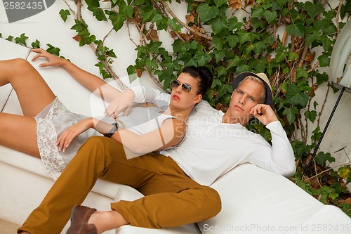 Image of Elegant trendy young couple