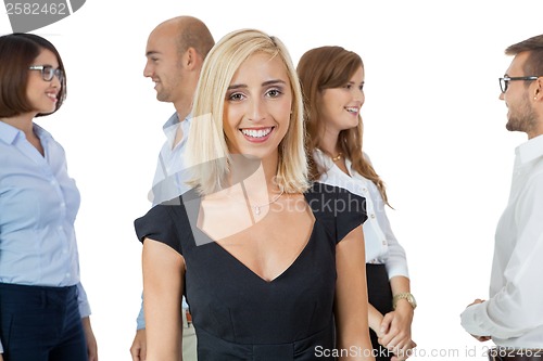 Image of Successful business team cheering