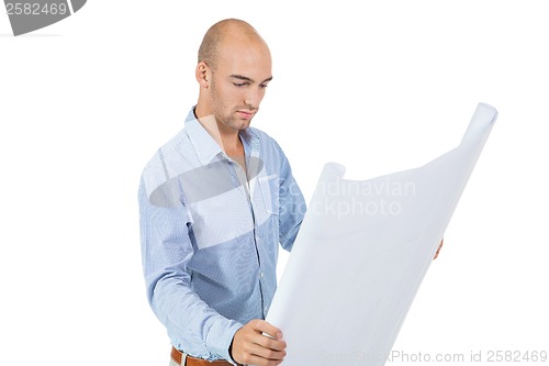 Image of Architect reading a blueprint