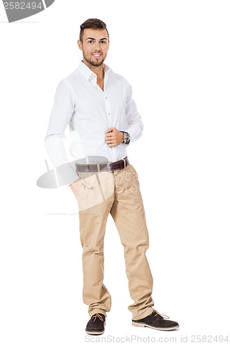 Image of Confident young man with his hand in his pocket