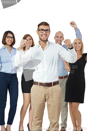Image of Successful business team cheering