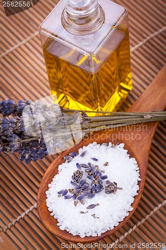 Image of lavender massage oil and bath salt aroma therapy wellness