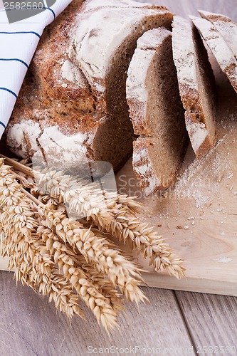 Image of homemade fresh baked bread and knife 