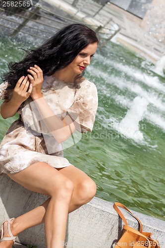 Image of brunette attractive woman in summer outdoor fashion