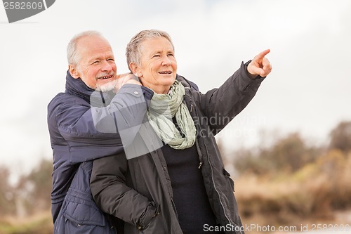 Image of happy senior couple elderly people together outdoor