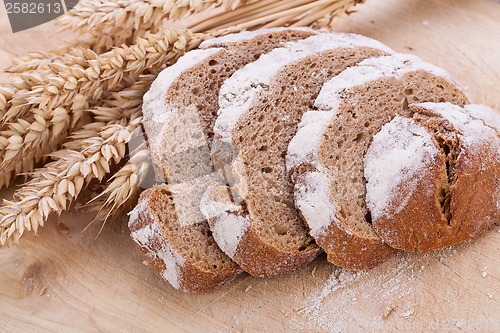 Image of homemade fresh baked bread and knife 