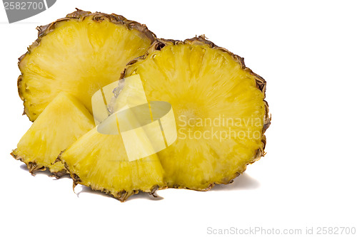Image of Cut off from the pineapple slices on white background.