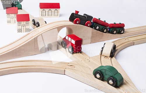 Image of heavy traffic near small toy town