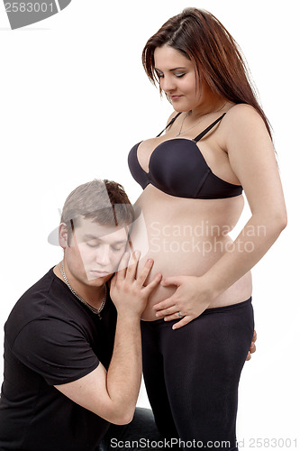 Image of loving happy couple pregnant woman with her husband