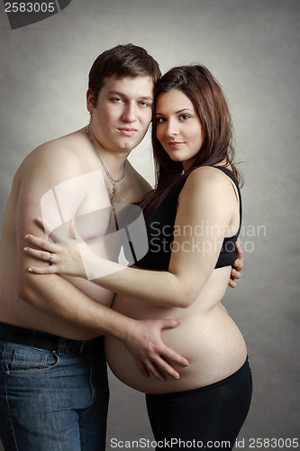Image of Loving happy couple, pregnant woman with her husband