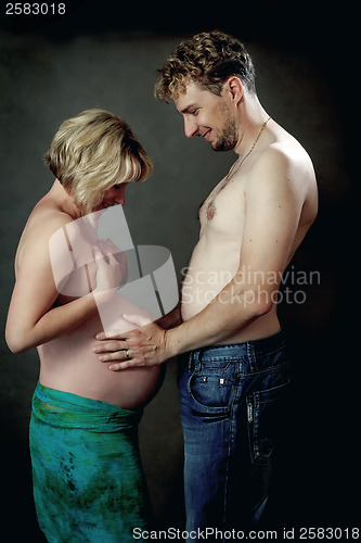 Image of Loving happy couple, pregnant woman with her husband