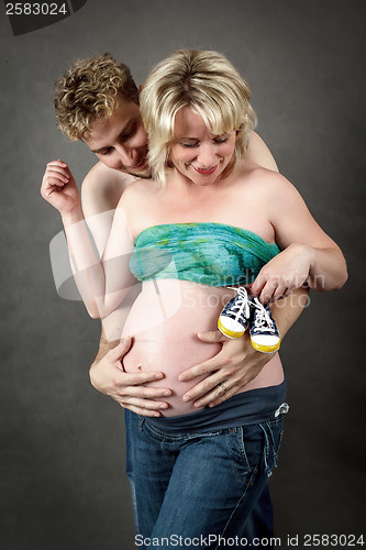 Image of Loving happy couple, pregnant woman with her husband