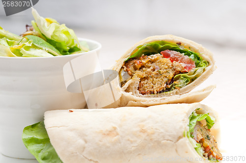 Image of falafel pita bread roll wrap sandwich