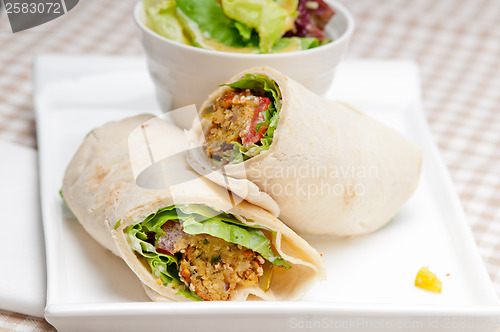 Image of falafel pita bread roll wrap sandwich