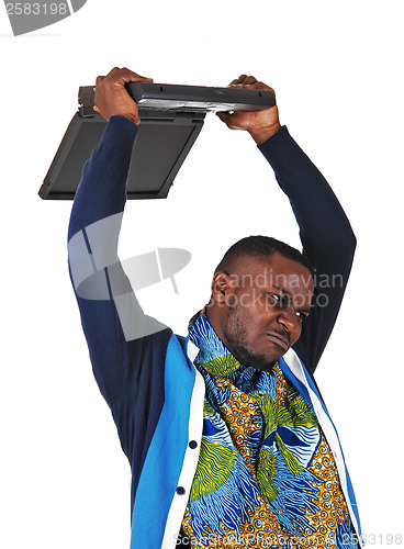 Image of Black man throwing his laptop.