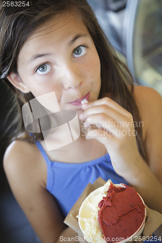 Image of Pretty Young Girl Enjoying Her Gelato