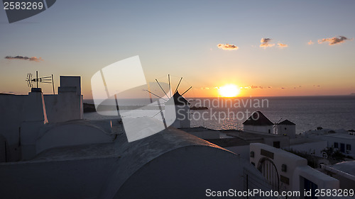 Image of Beautiful sunset in Oia, Santorini,. Greece