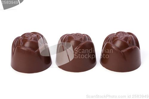 Image of chocolate pralines isolated on white background