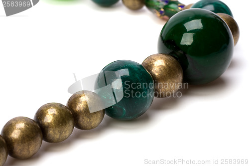 Image of green beads isolated on white background