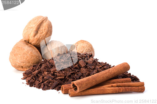 Image of grated chocolate and nuts isolated on white background
