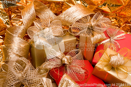 Image of Christmas background. Shiny gifts.