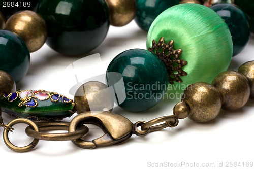 Image of green beads isolated on white background