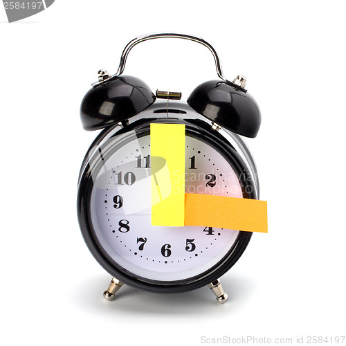 Image of Alarm clock with sticky paper 