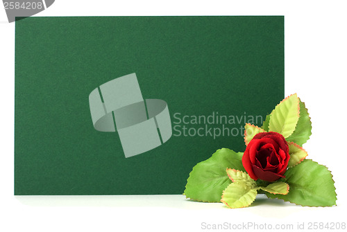 Image of Card with floral decor. Flowers are artificial. 