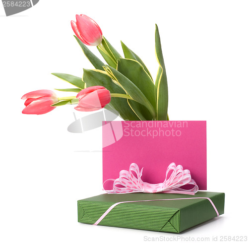 Image of gift with pink tulips  isolated on white background