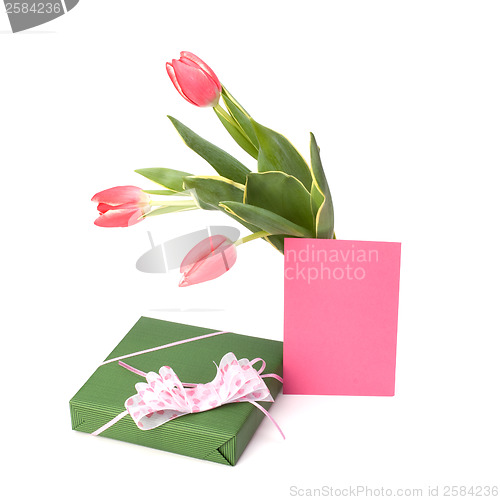 Image of gift with pink tulips  isolated on white background