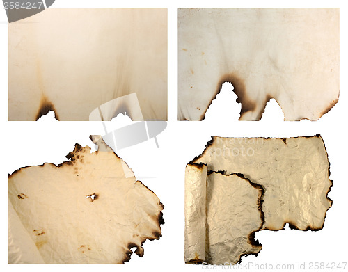 Image of Collection of burnt vintage paper isolated on white 