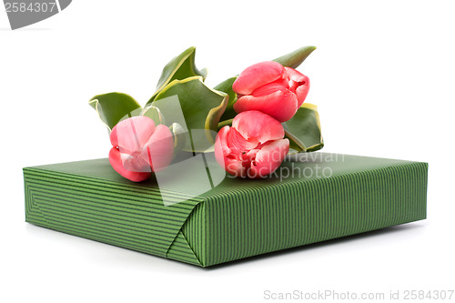 Image of gift with pink tulips  isolated on white background