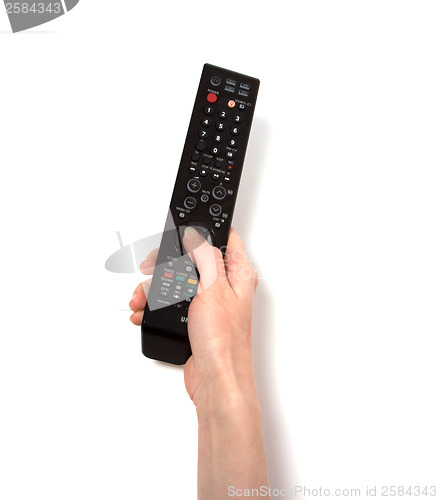 Image of Hand holding tv remote control isolated on white background 