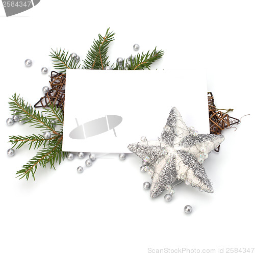 Image of Christmas decoration with greeting card isolated on white backgr