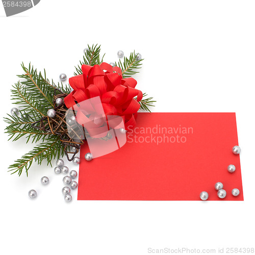 Image of Christmas decoration with greeting card isolated on white backgr
