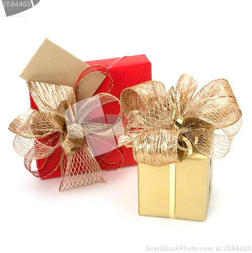 Image of 
Luxurious gifts with note isolated on white background 
