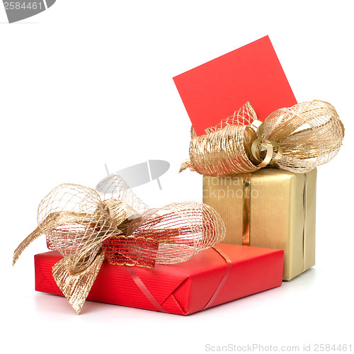 Image of 
Luxurious gifts with note isolated on white background 
