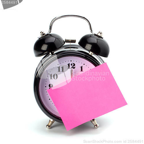 Image of Alarm clock with sticky paper 