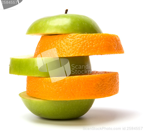 Image of mixed sliced fruits and pills isolated on white background
